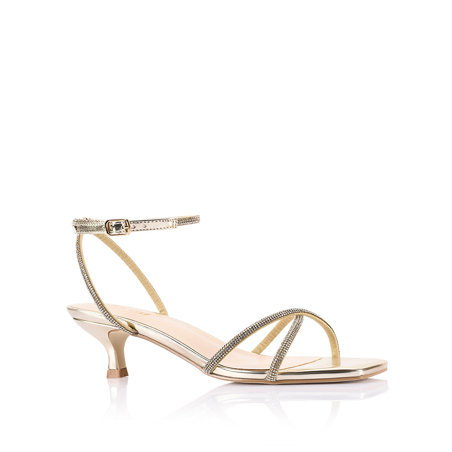 Gold high-heeled sandal with thin straps