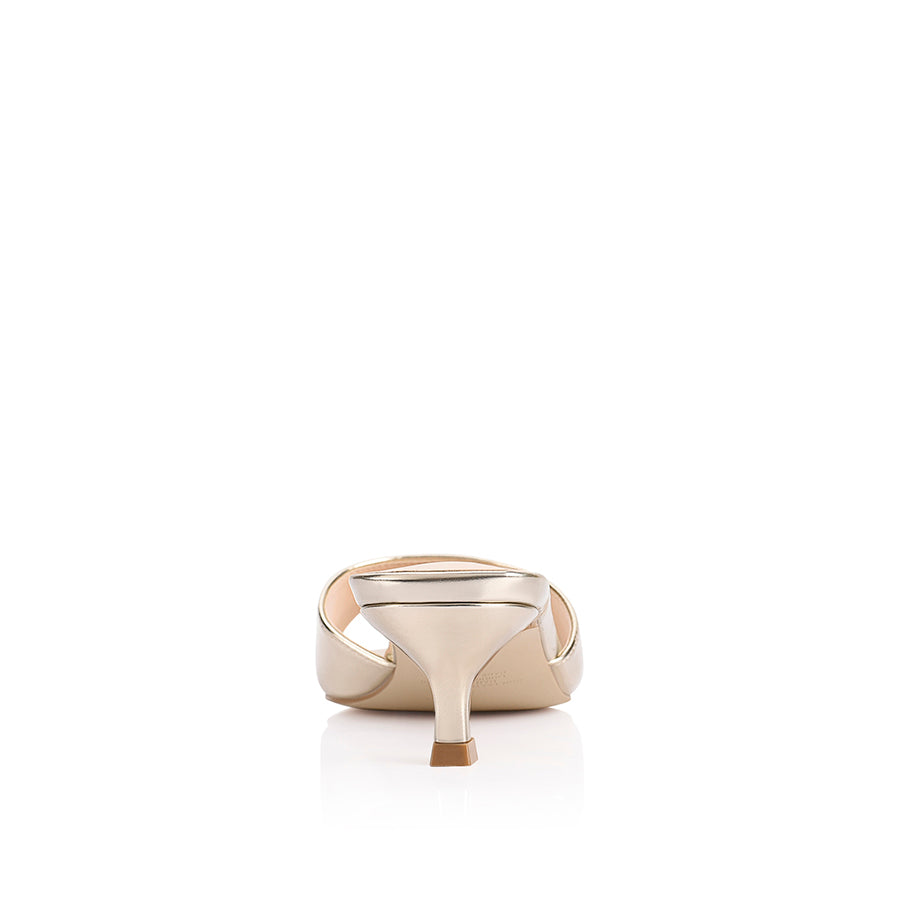 Gold sandal with kitten heel and square toe shape