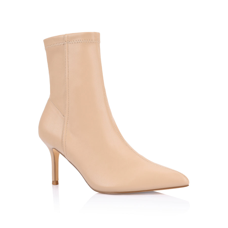 Womens beige ankle sock boot with stiletto heel and pointed toe
