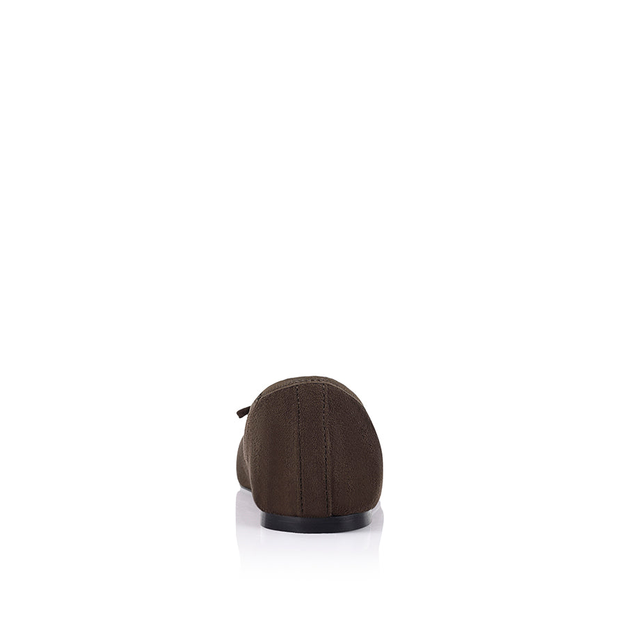 Brown microsuede ballet flats with a black heel and small bow