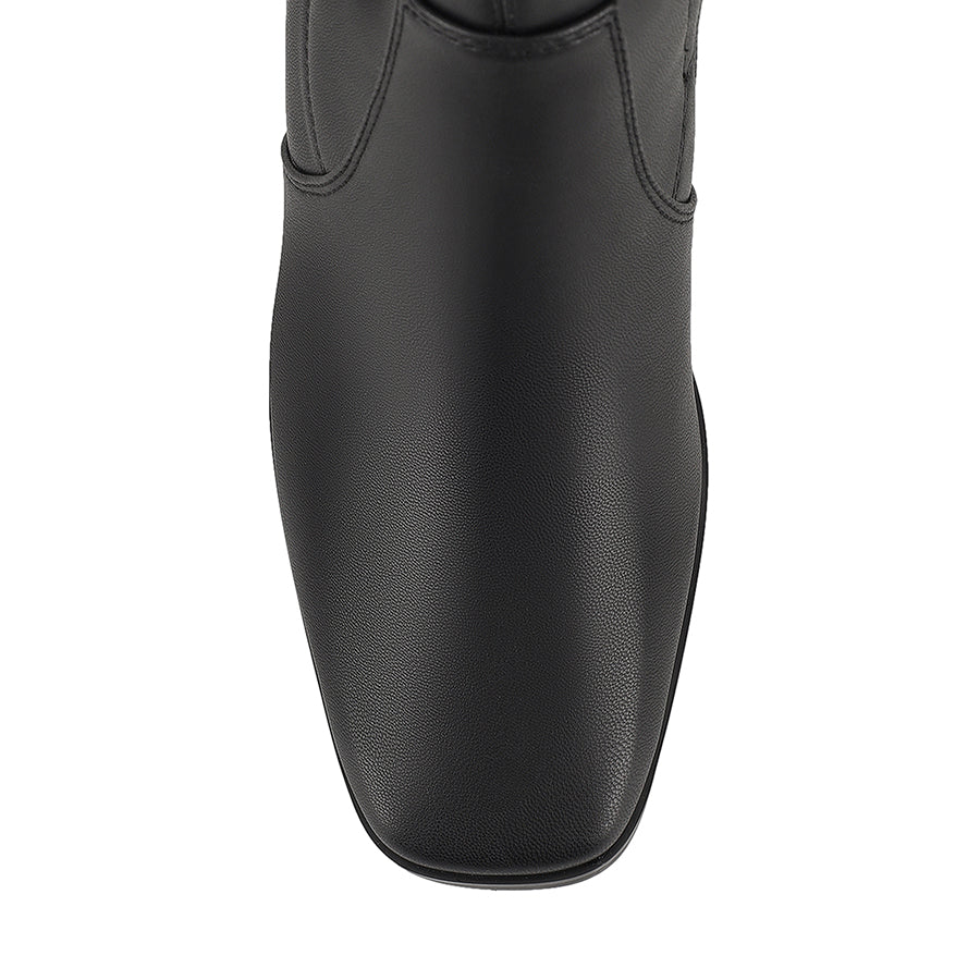 Black knee high boots with zip closure