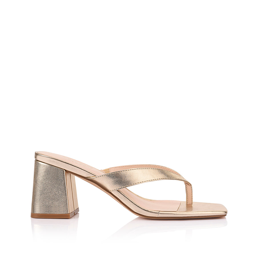Women's metallic champagne gold block thong heel with square toe