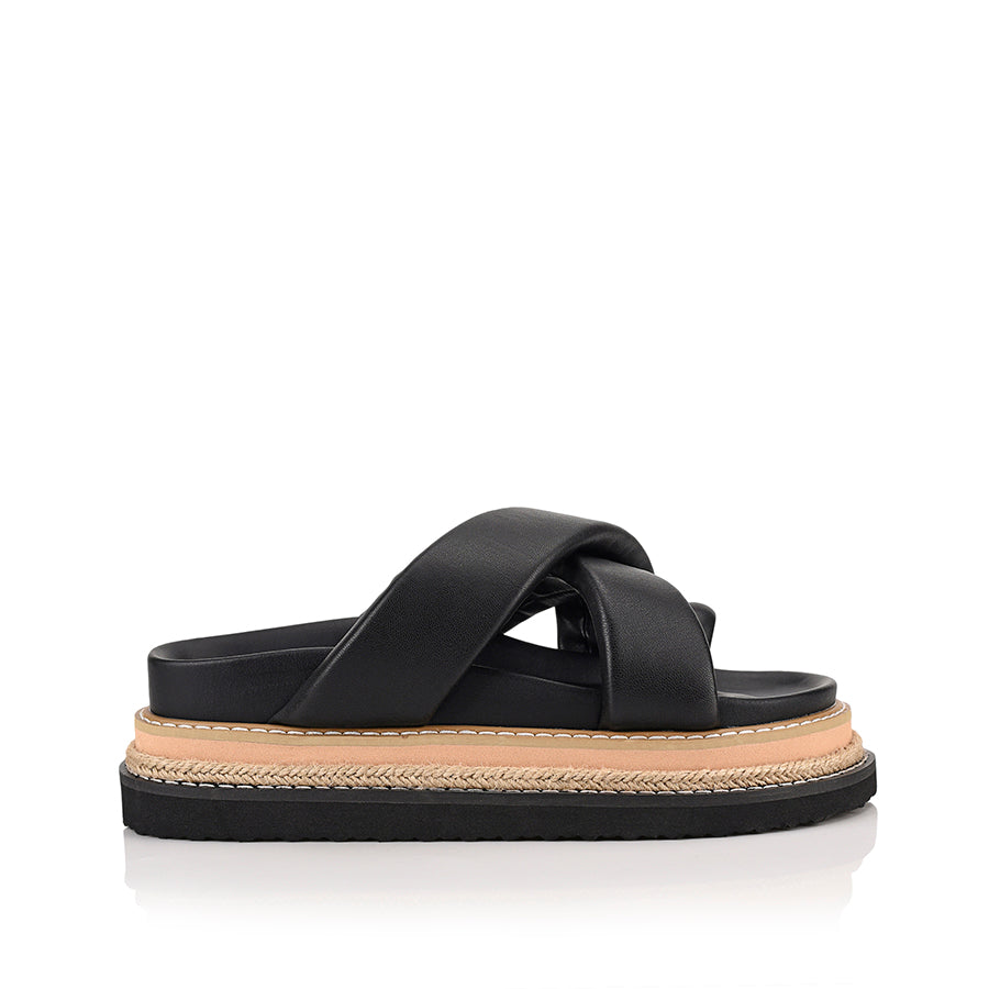 Women's black puffy platform slides with toe ring and contrast sole