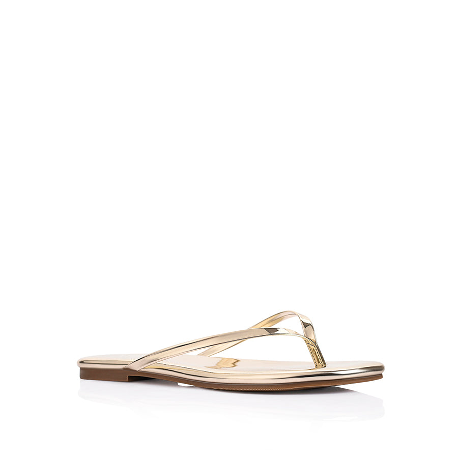Women's vegan flat thongs in metallic gold mirror