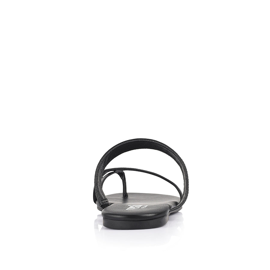 Women's black flat sandal with crossover straps and toe ring