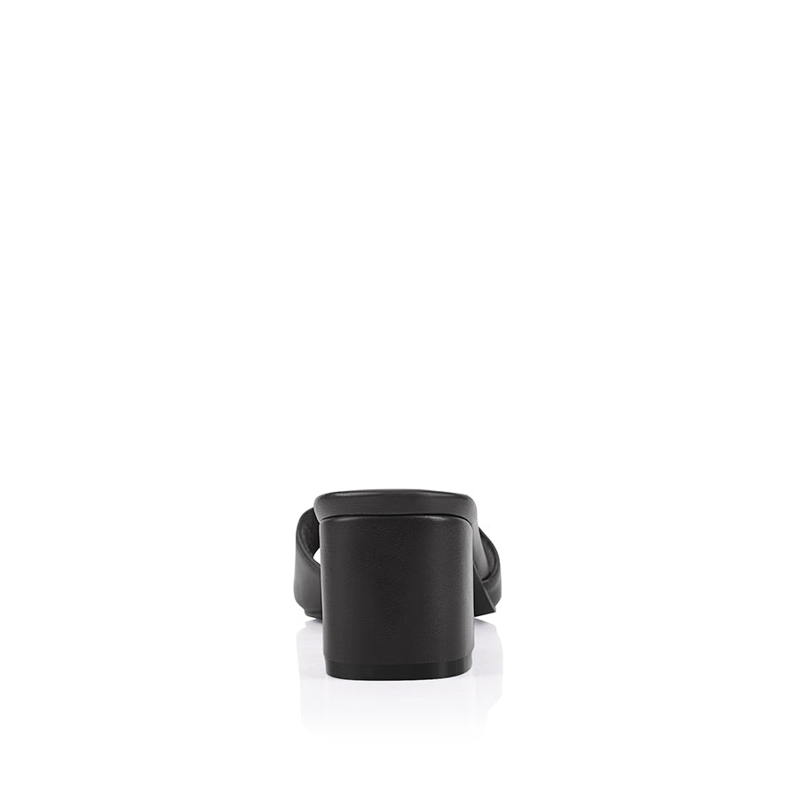 Black block heel mule with a square toe shape