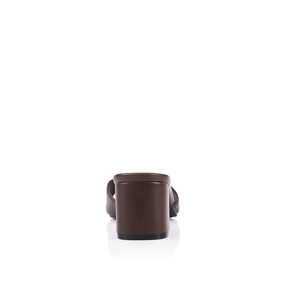 Chocolate block heel mule with a square toe shape