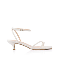 White square toe sandal with a kitten heel and an adjustable strap