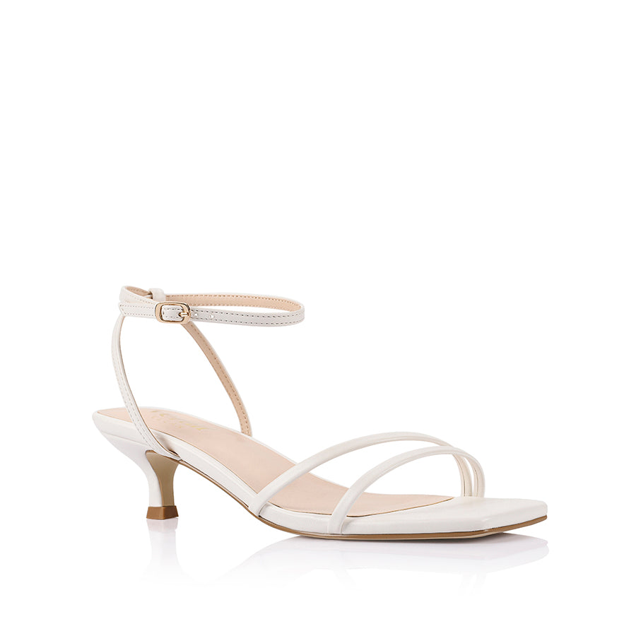 White square toe sandal with a kitten heel and an adjustable strap