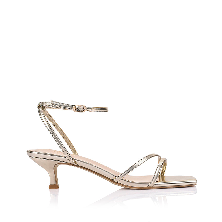 Gold square toe sandal with a kitten heel and an adjustable strap
