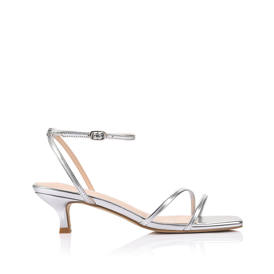 Silver square toe sandal with a kitten heel and an adjustable strap