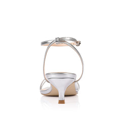 Silver square toe sandal with a kitten heel and an adjustable strap