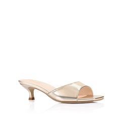 Gold sandal with kitten heel and square toe shape