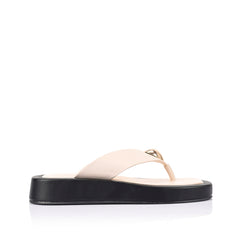 Women's black and bone white platform thong with gold heart embellishment 