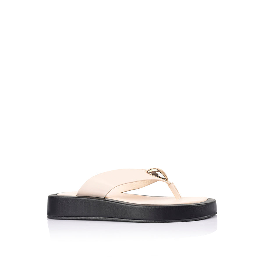 Women's black and bone white platform thong with gold heart embellishment 