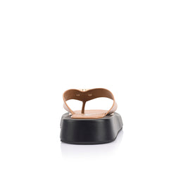 Women's black and dark camel brown platform thong with gold heart embellishment 