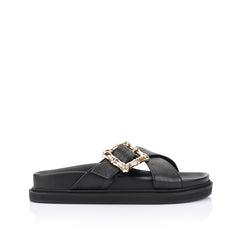 Women's black footbed slides with gold buckle