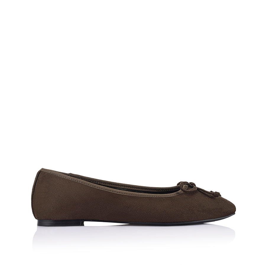 Brown microsuede ballet flats with a black heel and small bow