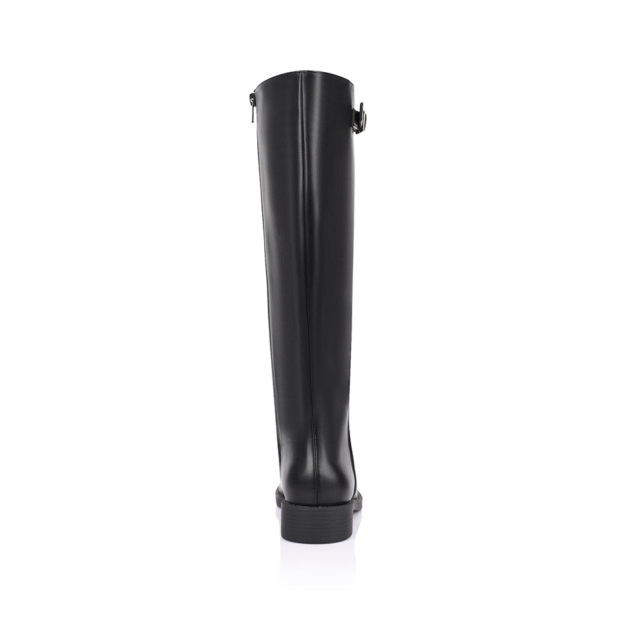 Women's wide calf flat knee high riding boot in black vegan leather