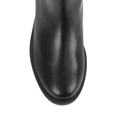 Women's wide calf flat knee high riding boot in black vegan leather