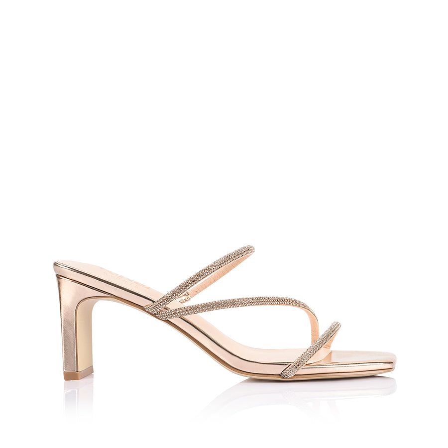 Rose gold high-heeled sandal with thin straps