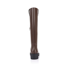 Brown knee-high boot on a a chunky sole