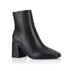 Black ankle boots with a block heel, zip closure and square toe shape