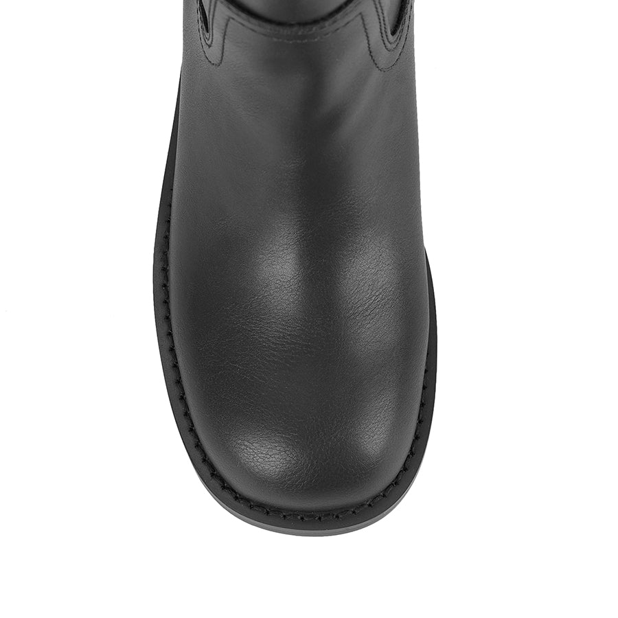 Black knee-high boot with a rounded toe shape