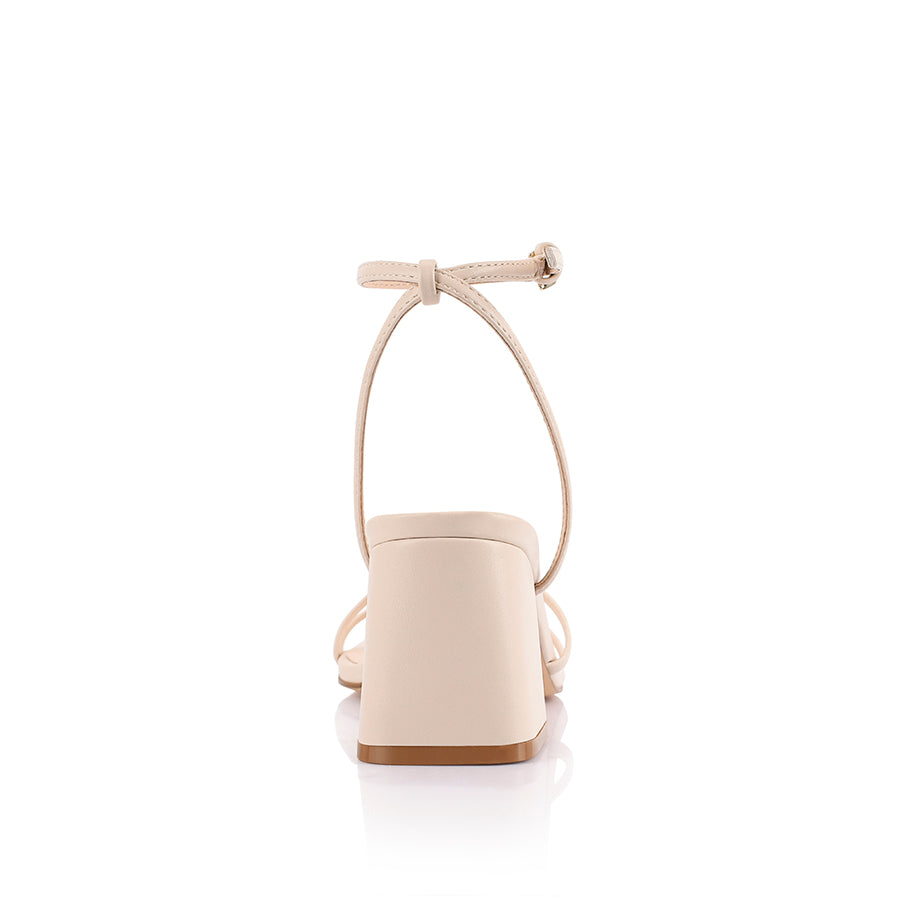 Women's strappy sandal with block heel, thin vamp straps, buckle on ankle strap and square toe in bone vegan material