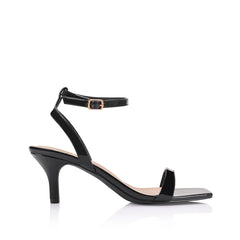 Women's black patent strappy low heel with ankle strap, square toe and gold buckle