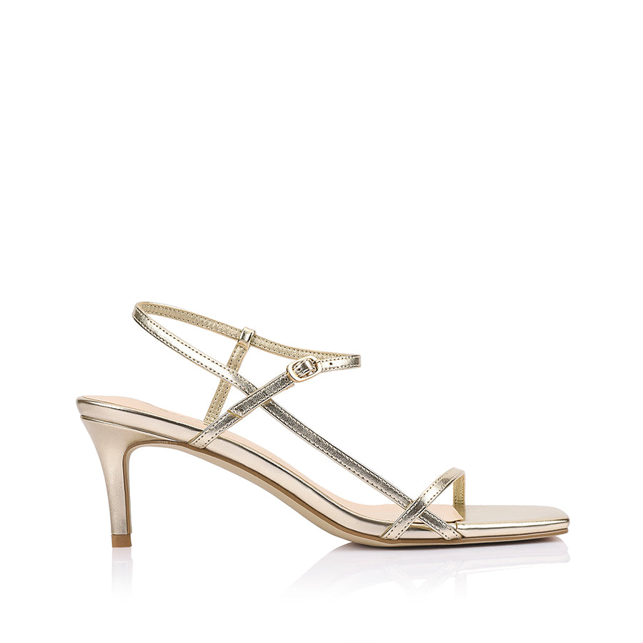 Women's champagne gold strappy stiletto sandal with buckle fastening and square toe in vegan upper