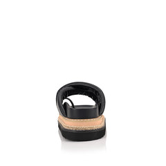 Women's black puffy platform slides with toe ring and contrast sole