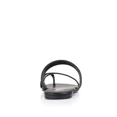 Women's black flat sandal with crossover straps and toe ring