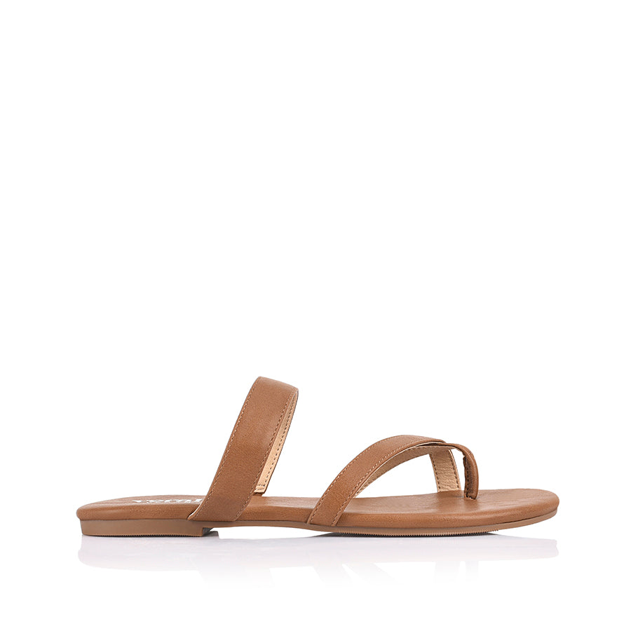 Women's vegan tan flat sandal with crossover straps and toe ring