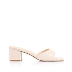 White block heel mule with a square toe shape