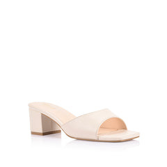 White block heel mule with a square toe shape