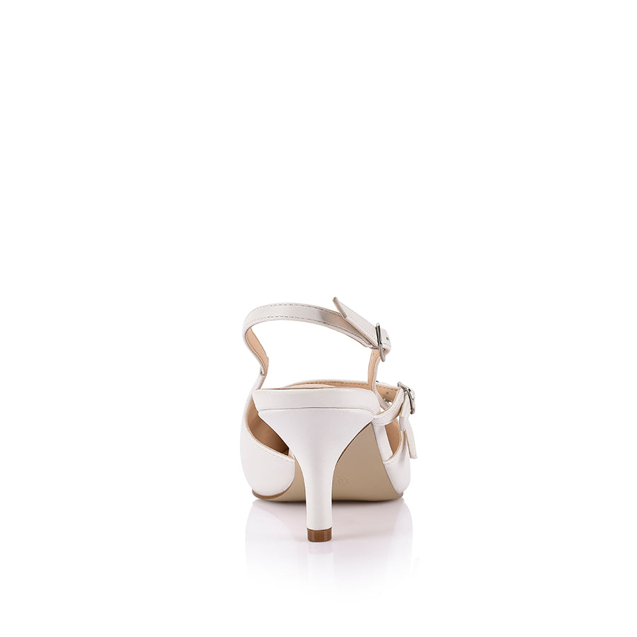 Women's white slingback pumps with buckle detailing